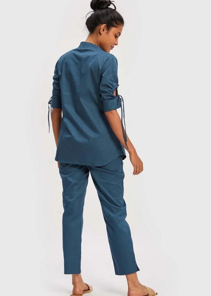 A Model Wearing Blue Cotton The Goes with Everything Pant Blue, curated by Only Ethikal