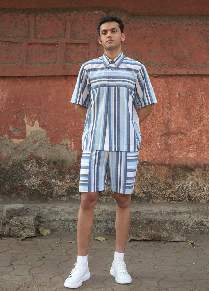 A model wearing Striped Multicolor Handwoven Cotton Panelled T-Shirt, curated by Only Ethikal