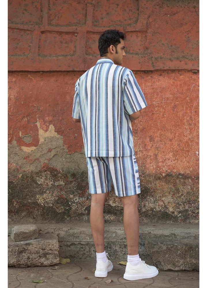 A model wearing Striped Multicolor Handwoven Cotton Panelled T-Shirt, curated by Only Ethikal