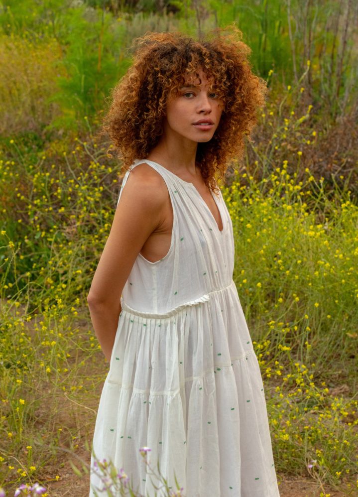 A Model Wearing White Handwoven Cotton Off white tiered midi dress, curated by Only Ethikal