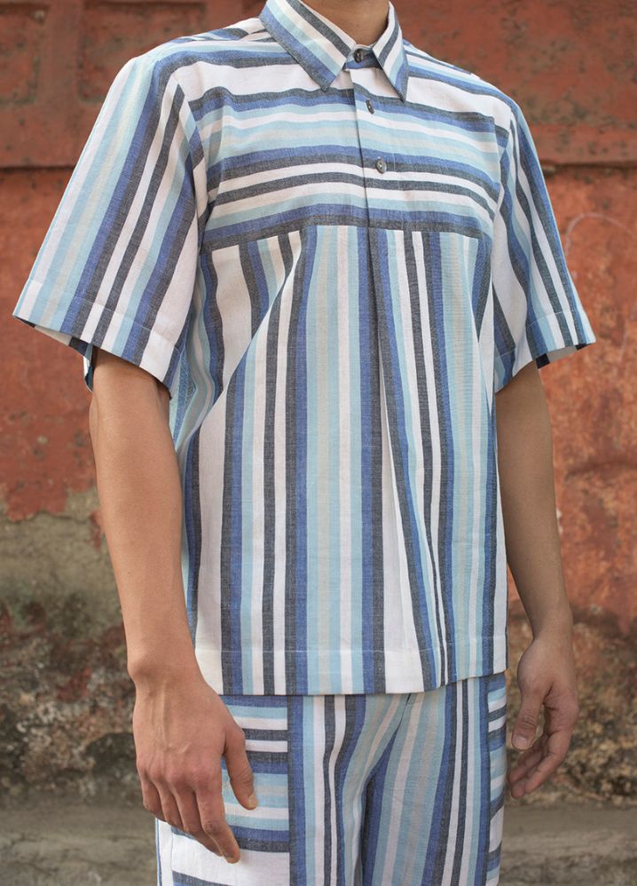 A model wearing Striped Multicolor Handwoven Cotton Panelled T-Shirt, curated by Only Ethikal