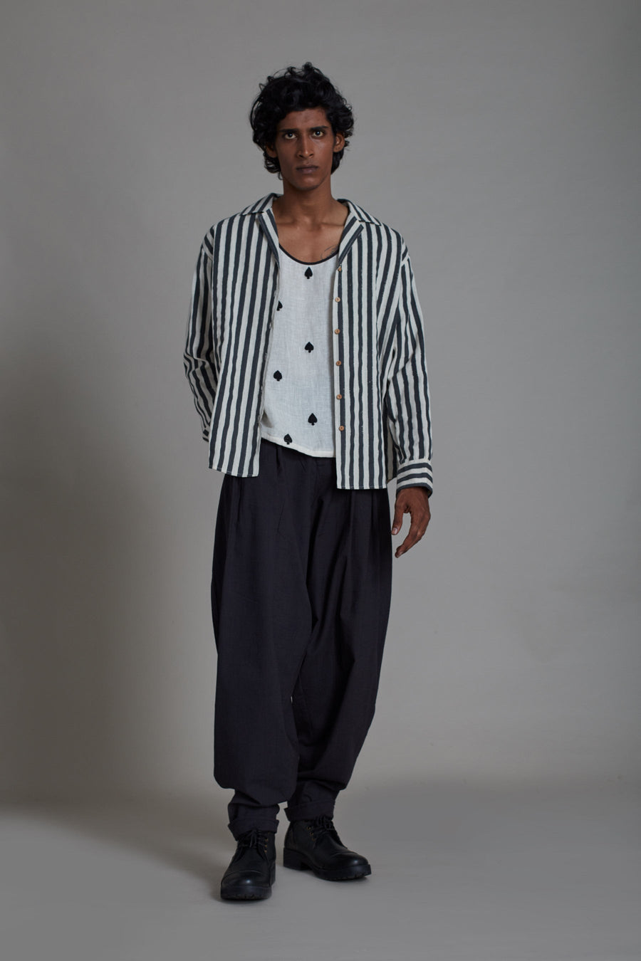 A Model Wearing White Pure Cotton Black Striped Taash Set-3 Pcs, curated by Only Ethikal
