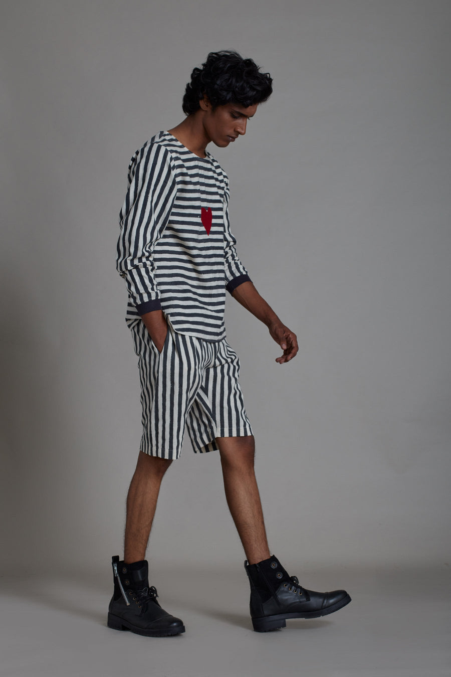 A Model Wearing White Pure Cotton Black Stripe Shorts, curated by Only Ethikal