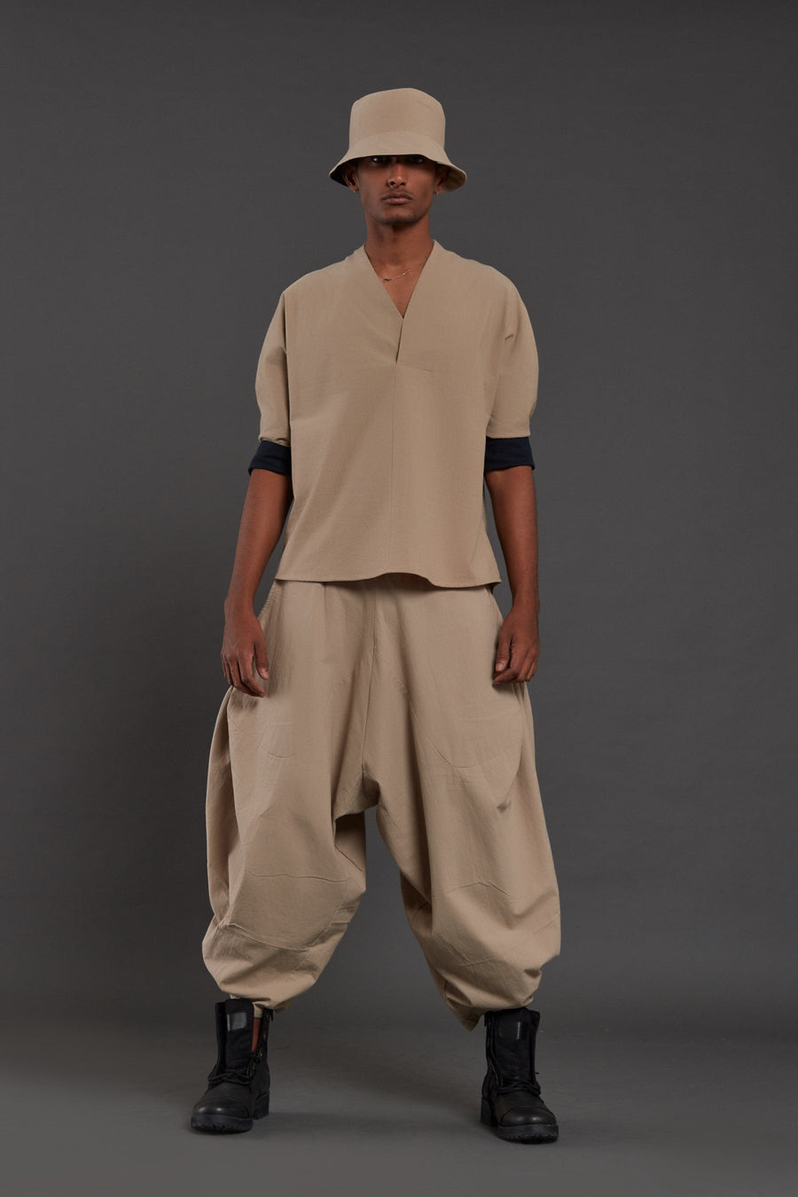A Model Wearing Beige Pure Cotton Beige Baggy Pants, curated by Only Ethikal