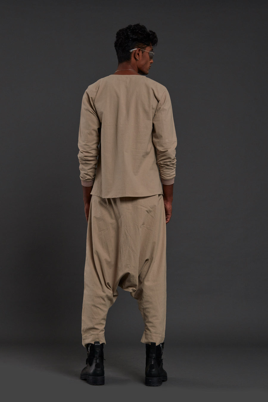A Model Wearing Beige Pure Cotton Beige Drop Crotch Pants, curated by Only Ethikal