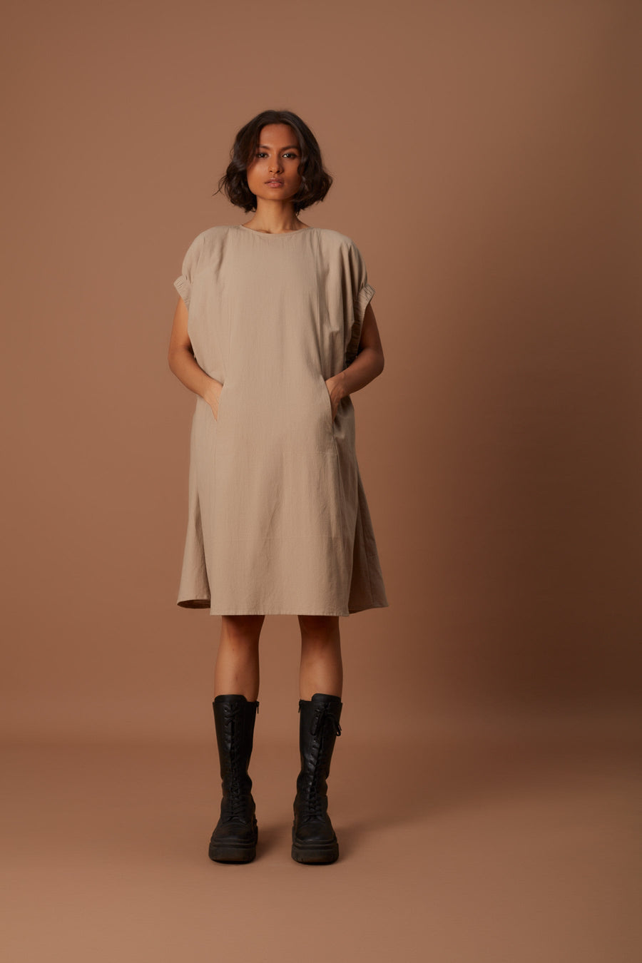 A Model Wearing Beige Pure Cotton Beige Pocket Dress, curated by Only Ethikal