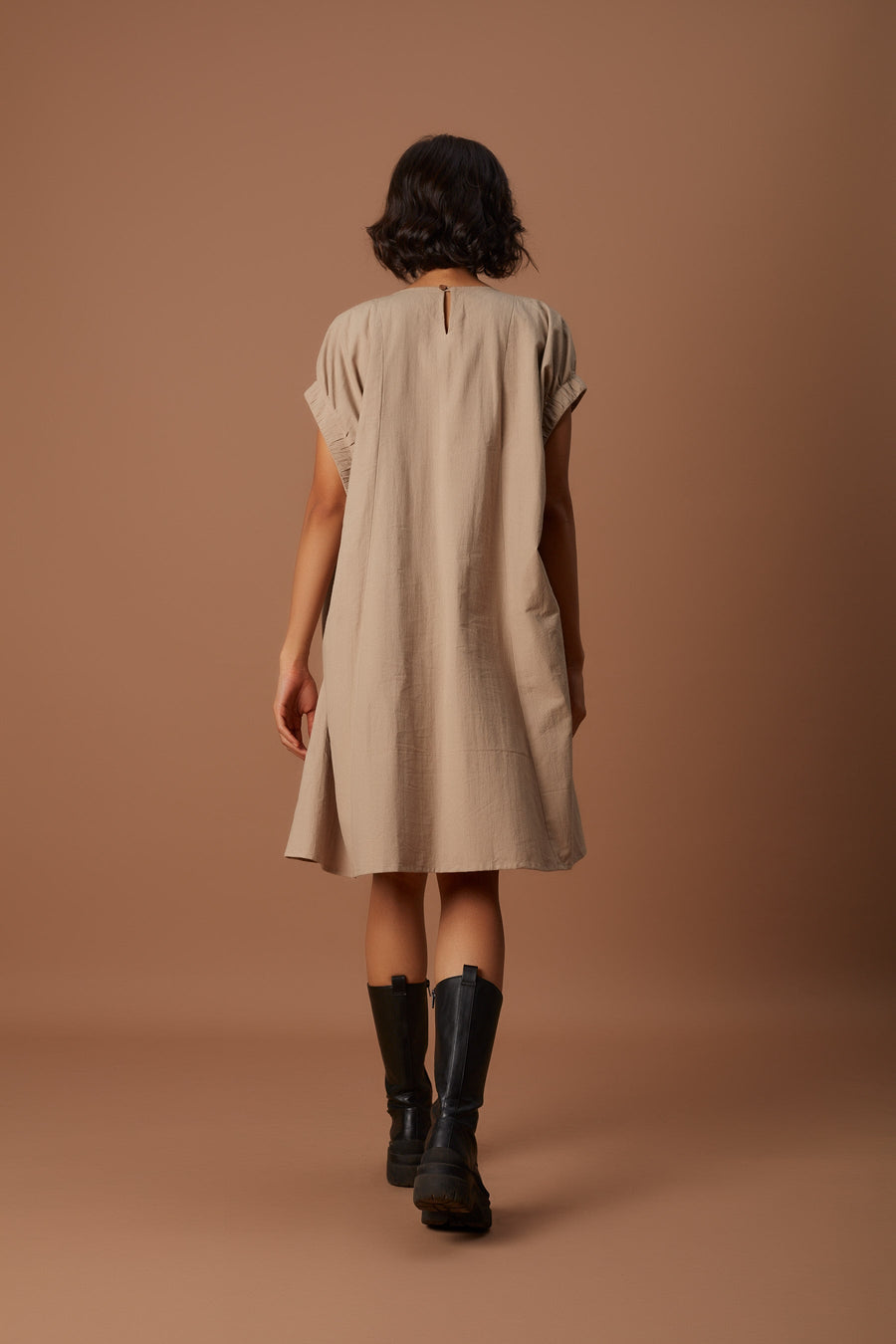A Model Wearing Beige Pure Cotton Beige Pocket Dress, curated by Only Ethikal
