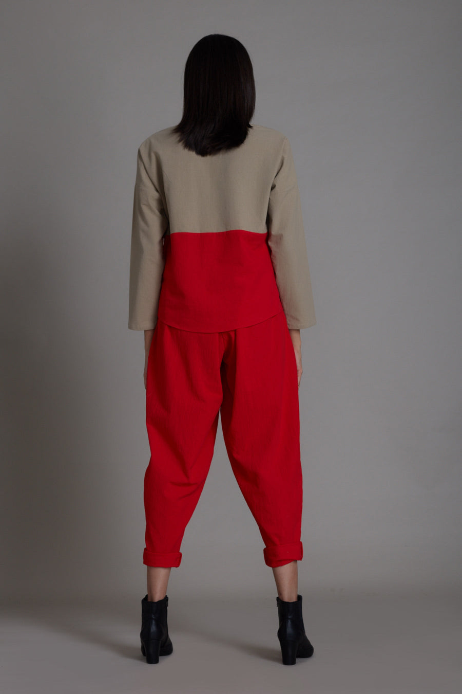 A Model Wearing Red Pure Cotton Beige & Red Rekin Set, curated by Only Ethikal