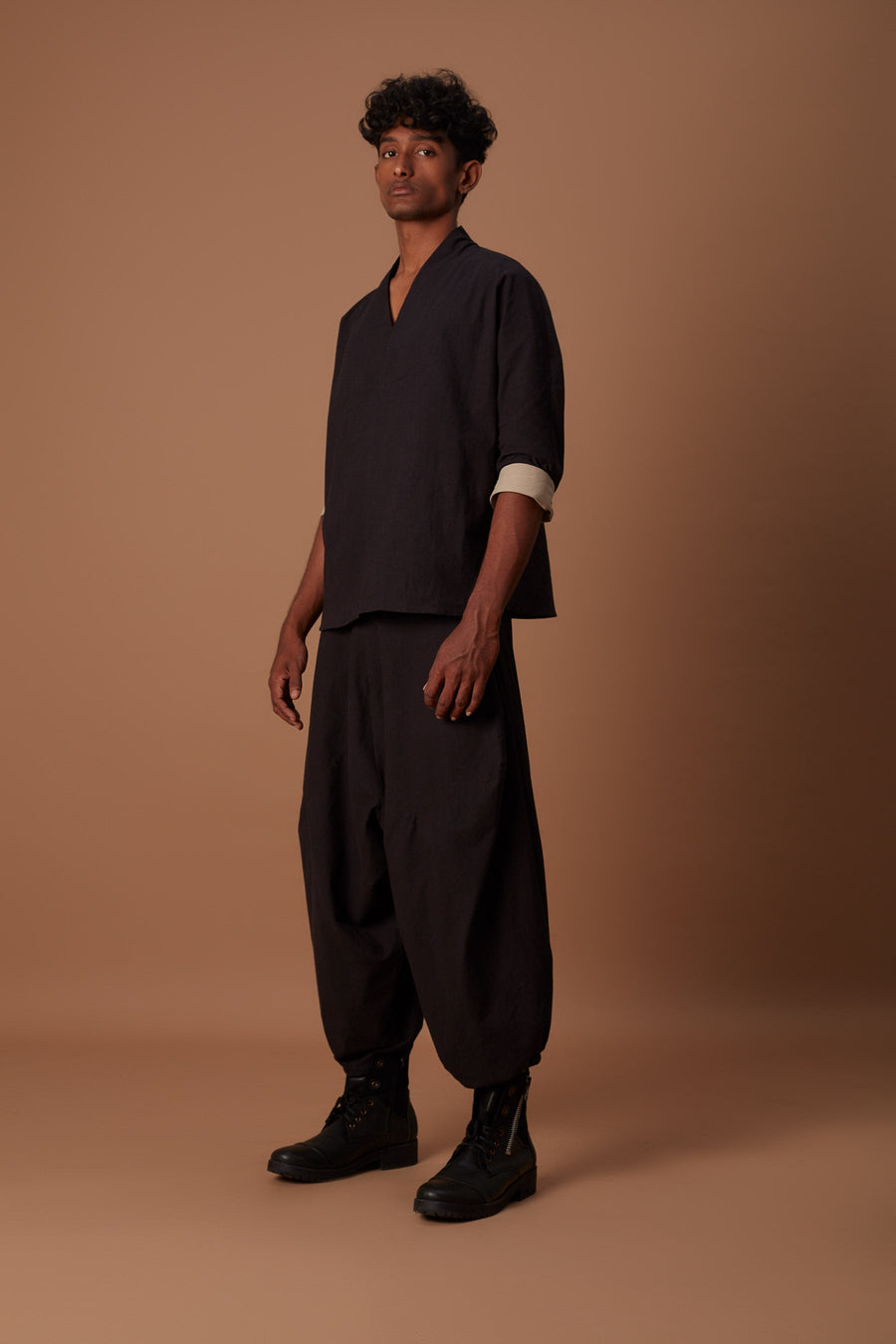 A Model Wearing Black Pure Cotton Black & Beige Overlap Shirt, curated by Only Ethikal