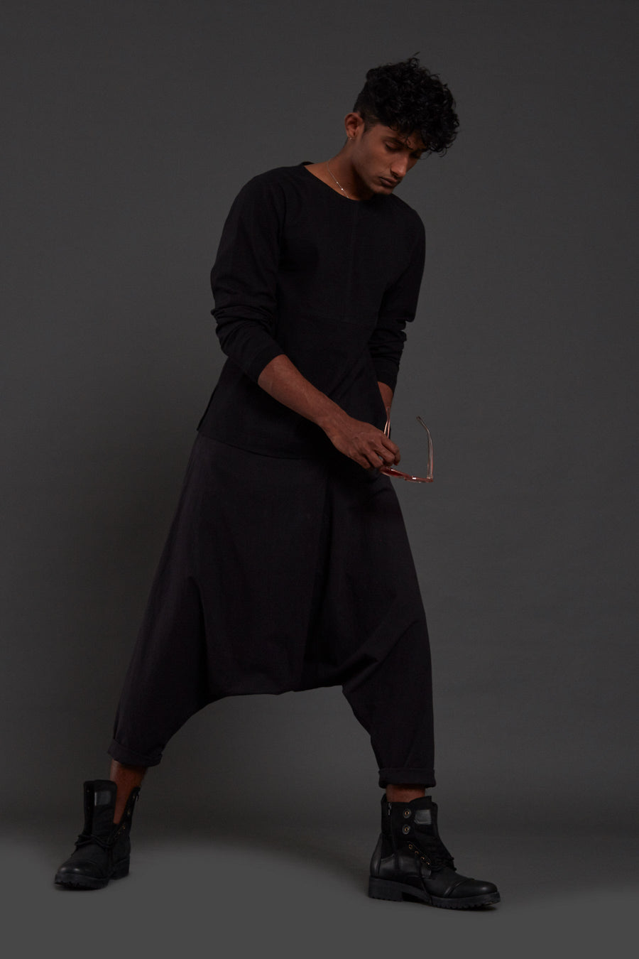 A Model Wearing Black Pure Cotton Black Drop Crotch Pants, curated by Only Ethikal