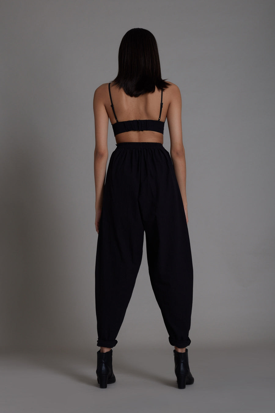 A Model Wearing Black Pure Cotton Black Mile Pants, curated by Only Ethikal
