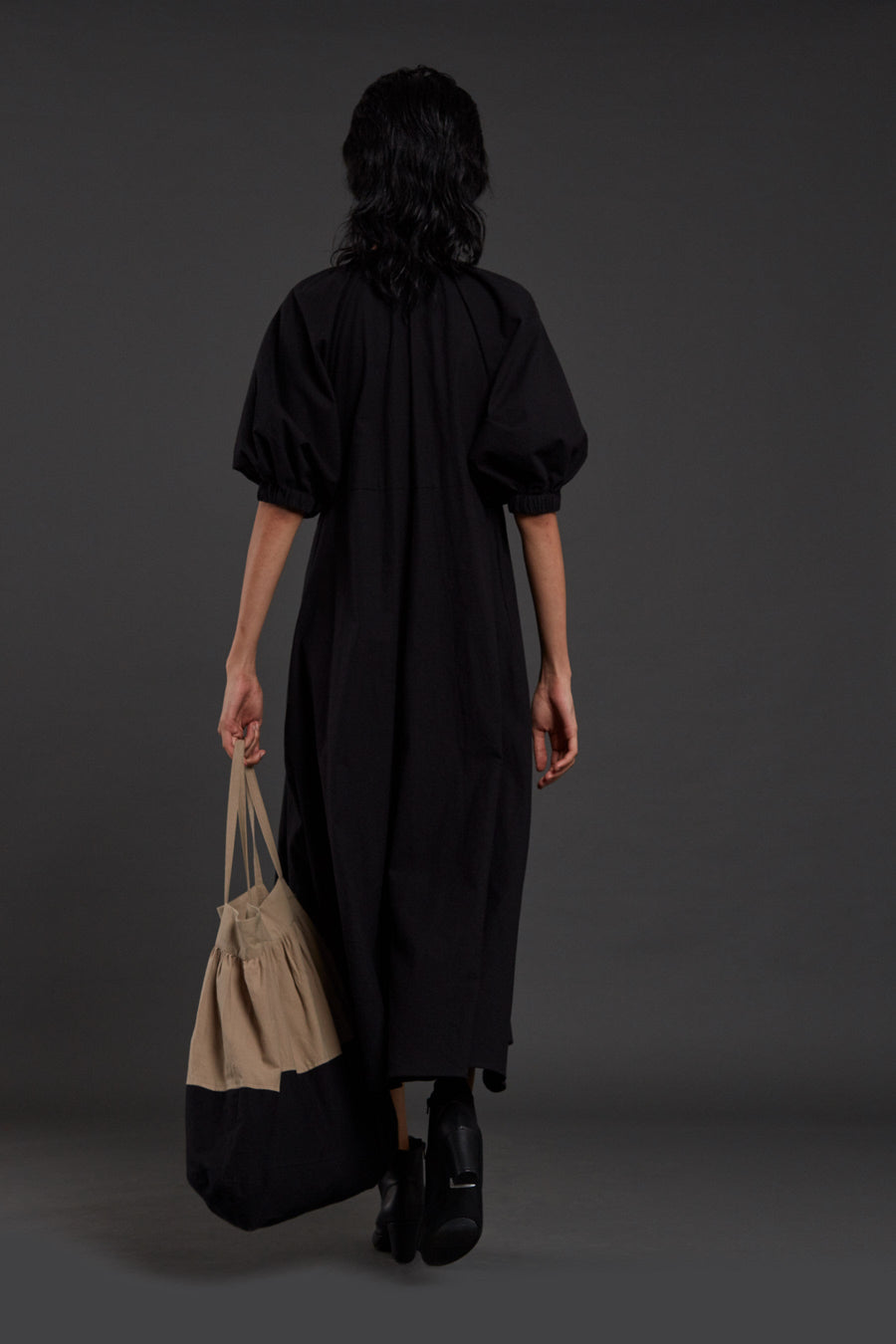 A Model Wearing Black Pure Cotton Black Raglan Dress, curated by Only Ethikal