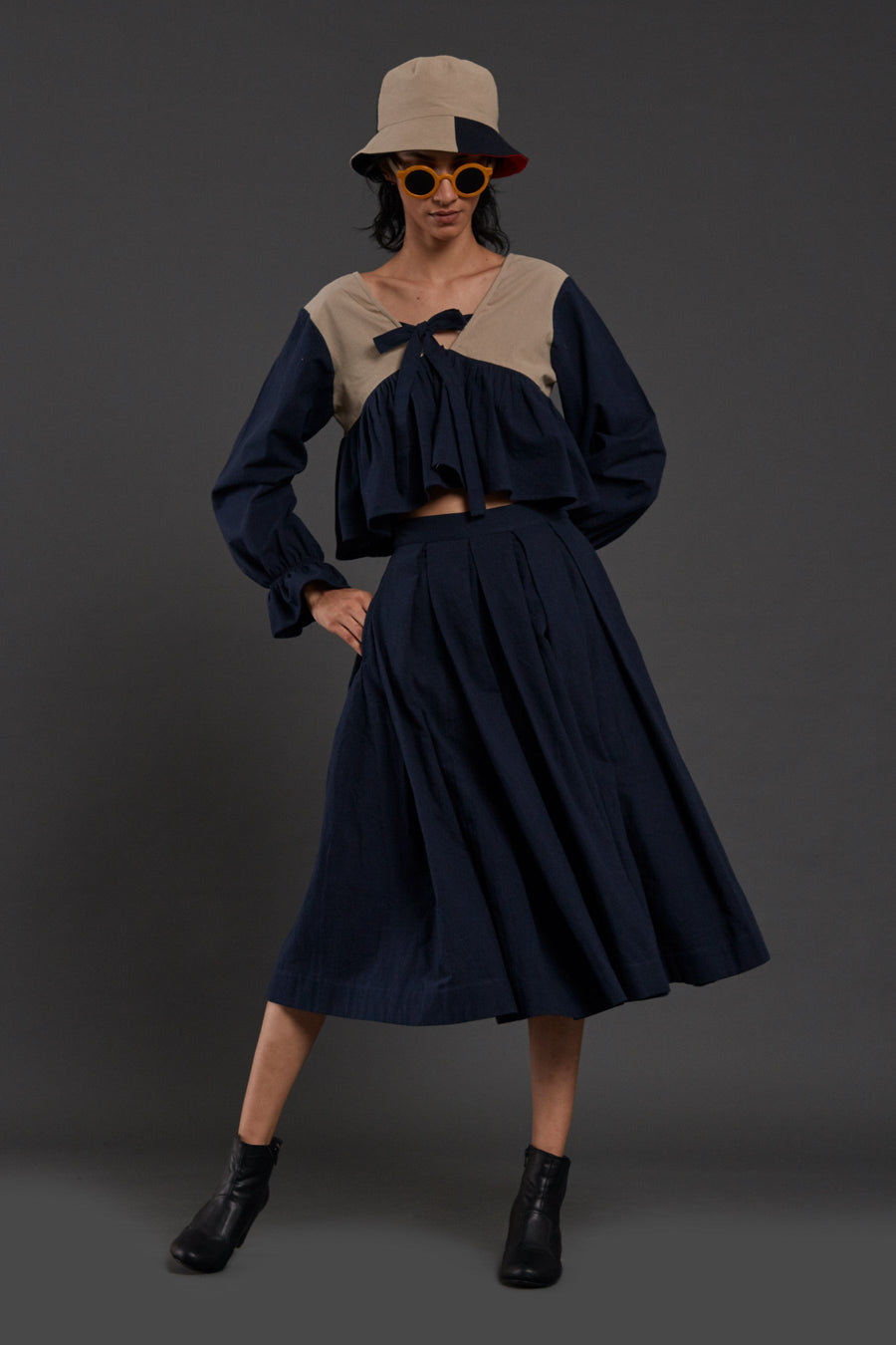 A Model Wearing Blue Pure Cotton Navy Blue Pleated Skirt, curated by Only Ethikal