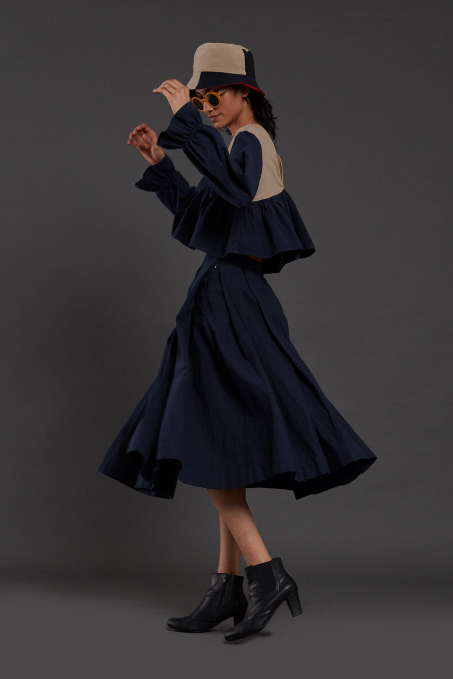 A Model Wearing Blue Pure Cotton Navy Blue Pleated Skirt, curated by Only Ethikal
