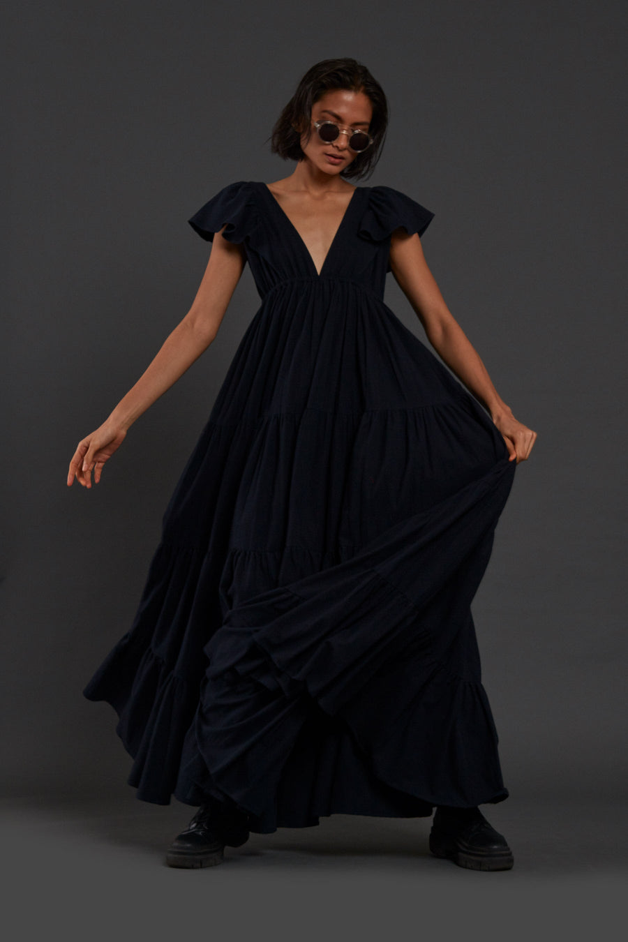 A Model Wearing Black Pure Cotton Navy Blue Tiered Gown, curated by Only Ethikal