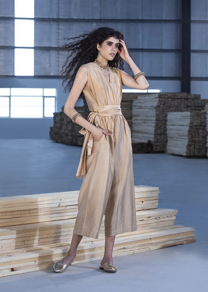 young woman in handcrafted Beige jumpsuit  curated by onlyethikal