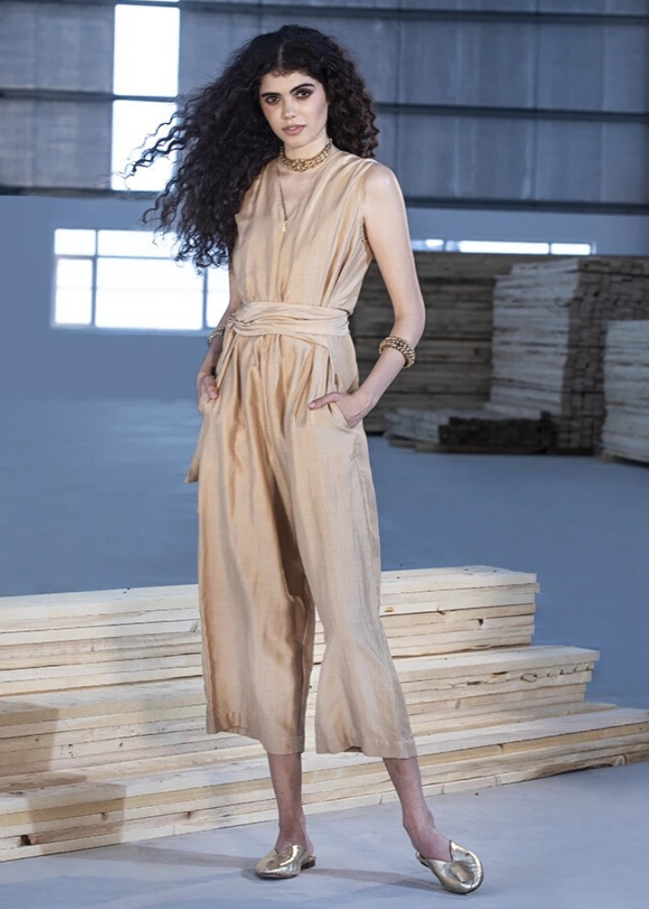 young woman in handcrafted Beige jumpsuit  curated by onlyethikal