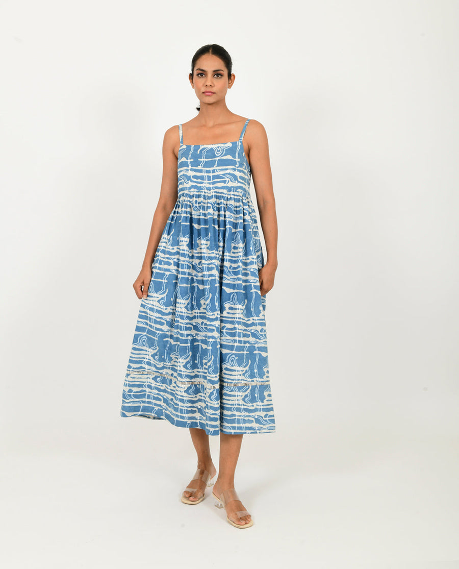 A Model Wearing Blue Organic Cotton Indigo Splash Gather Dress , curated by Only Ethikal