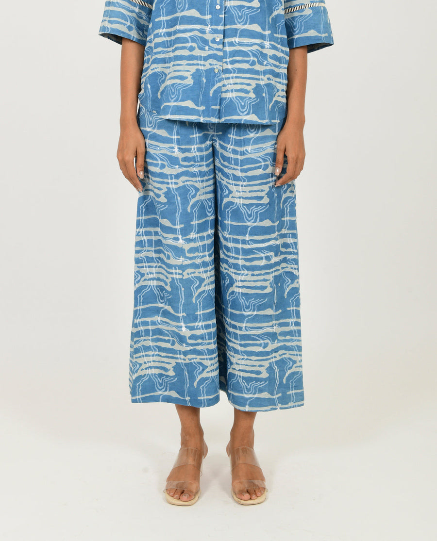 A Model Wearing Blue Linen Indigo Splash Linen Pants, curated by Only Ethikal