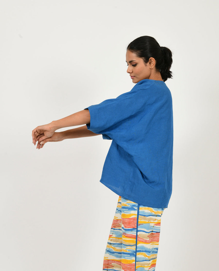 A Model Wearing Blue Organic Cotton Classic Blue Linen Overlay , curated by Only Ethikal