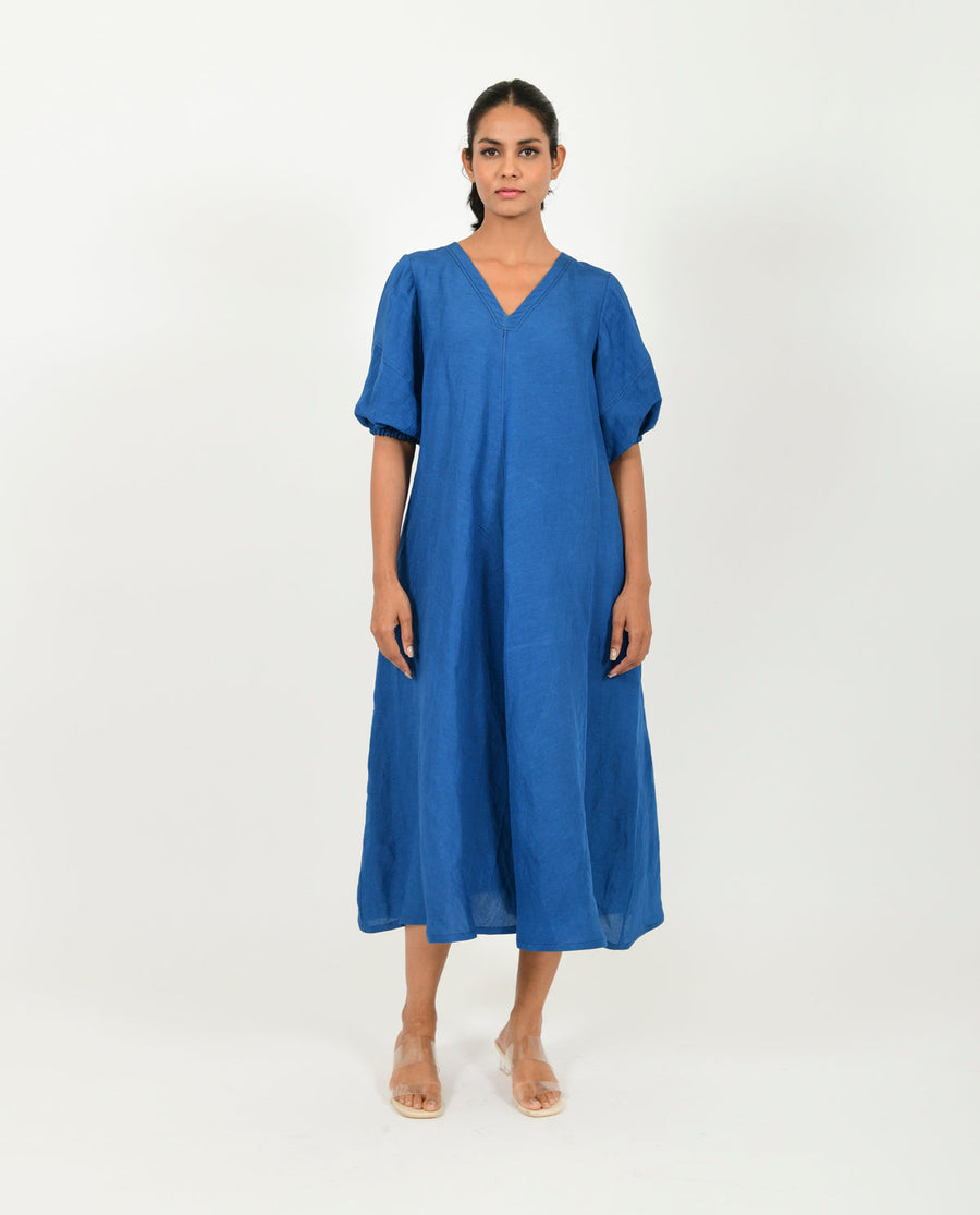 A Model Wearing Blue Organic Cotton Classic Blue Cotton Dress With Puffed Sleeves , curated by Only Ethikal