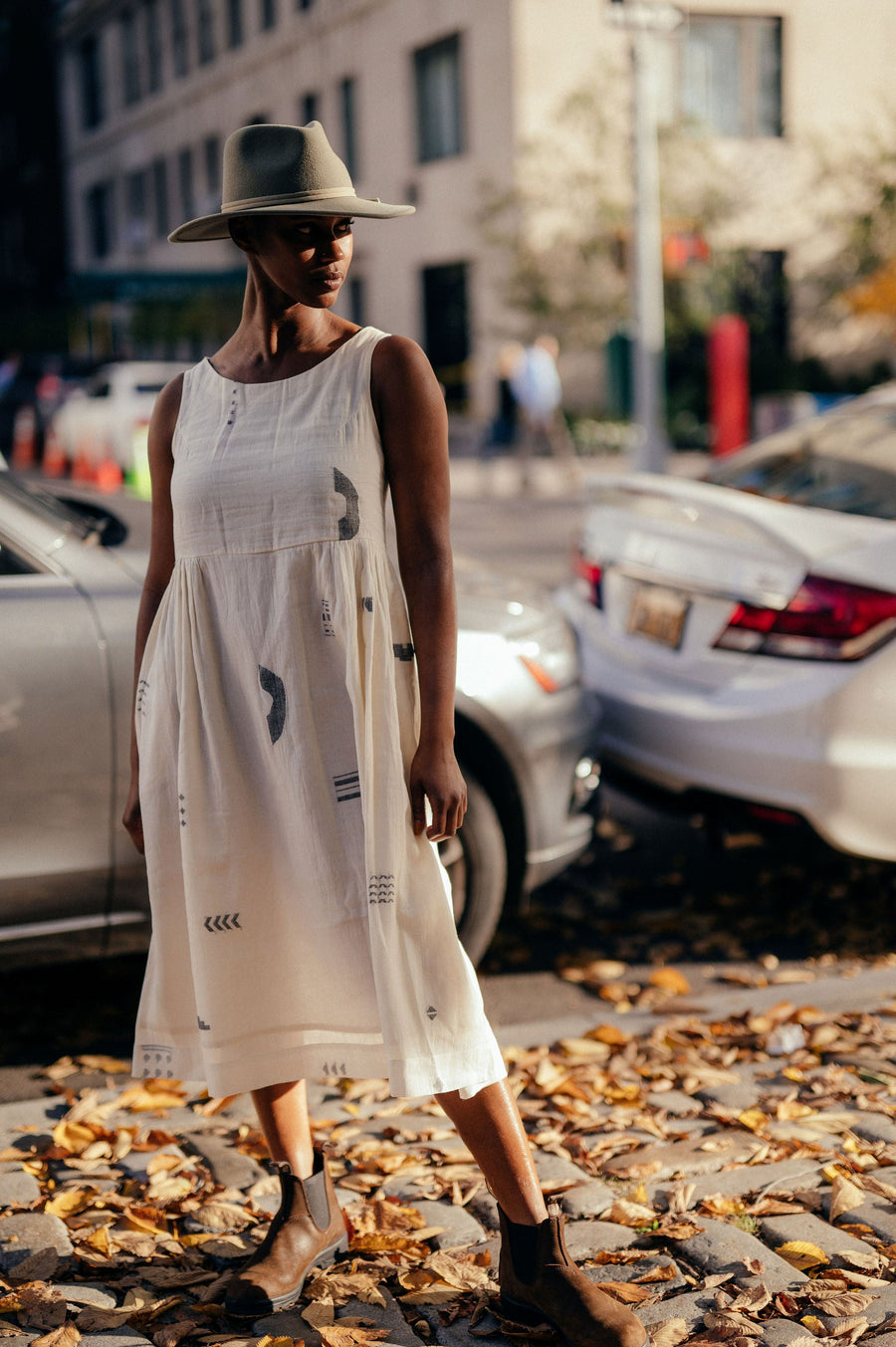 A Model Wearing White Handwoven Cotton Ivory Gathered Midi Dress, curated by Only Ethikal