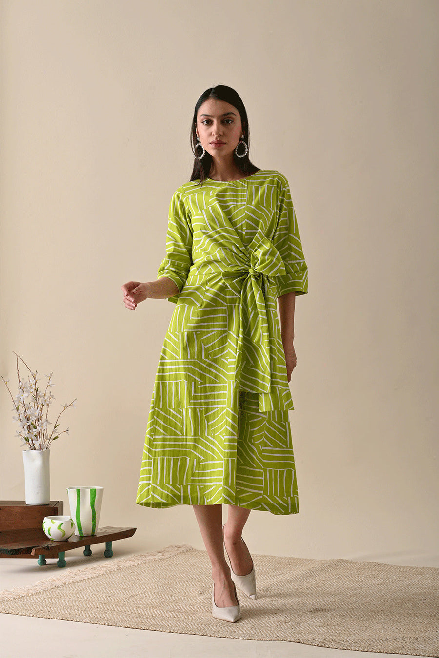 A Model Wearing Green Organic Cotton Claire Olive Print Dress, curated by Only Ethikal
