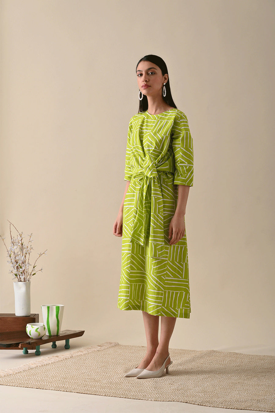 A Model Wearing Green Organic Cotton Claire Olive Print Dress, curated by Only Ethikal