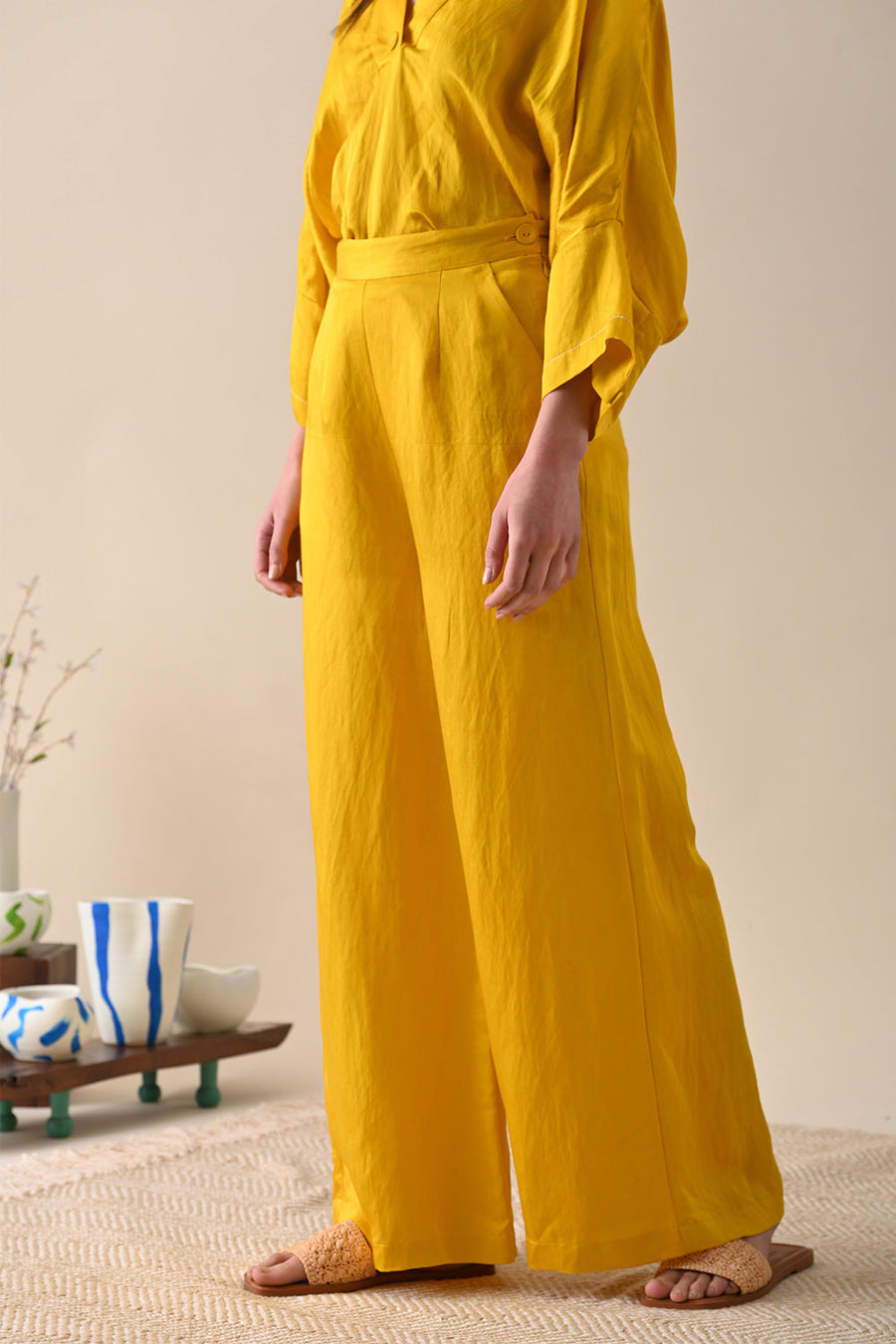 A Model Wearing Yellow Modal Satin Vita Trouser, curated by Only Ethikal