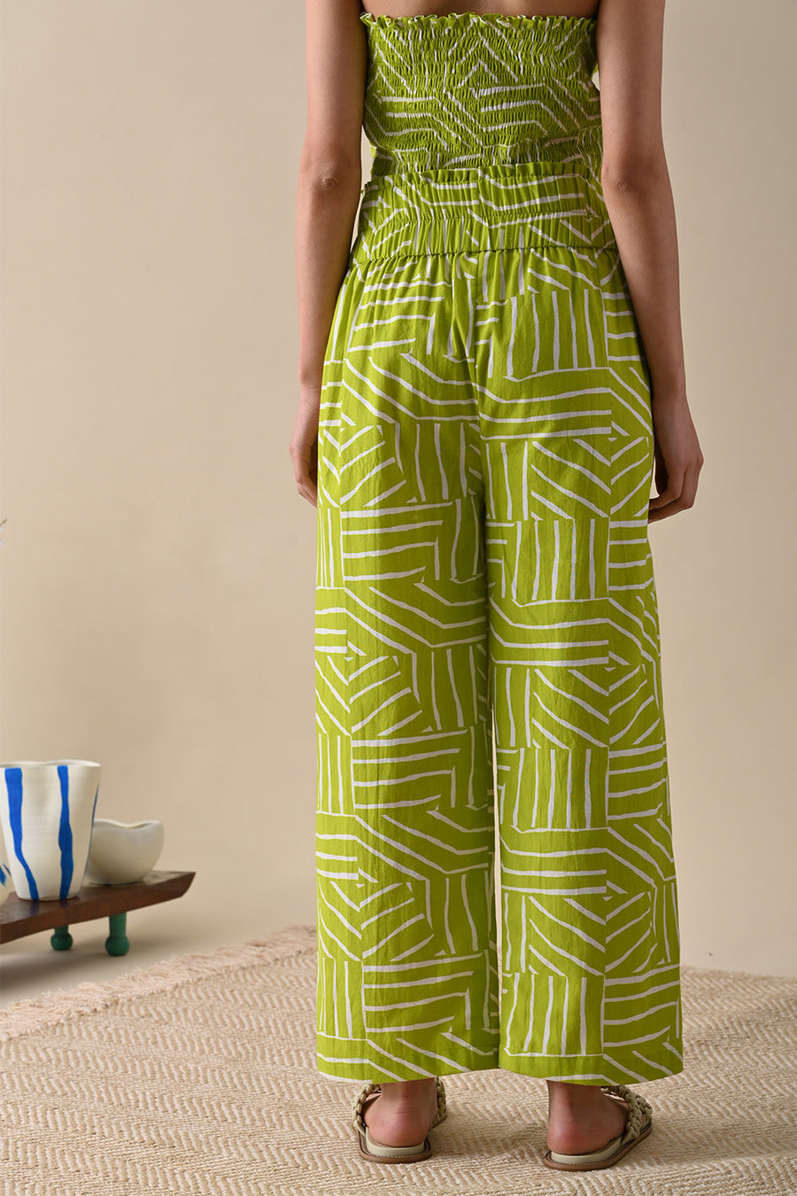 A Model Wearing Green Pure Cotton River Olive Print Trouser, curated by Only Ethikal