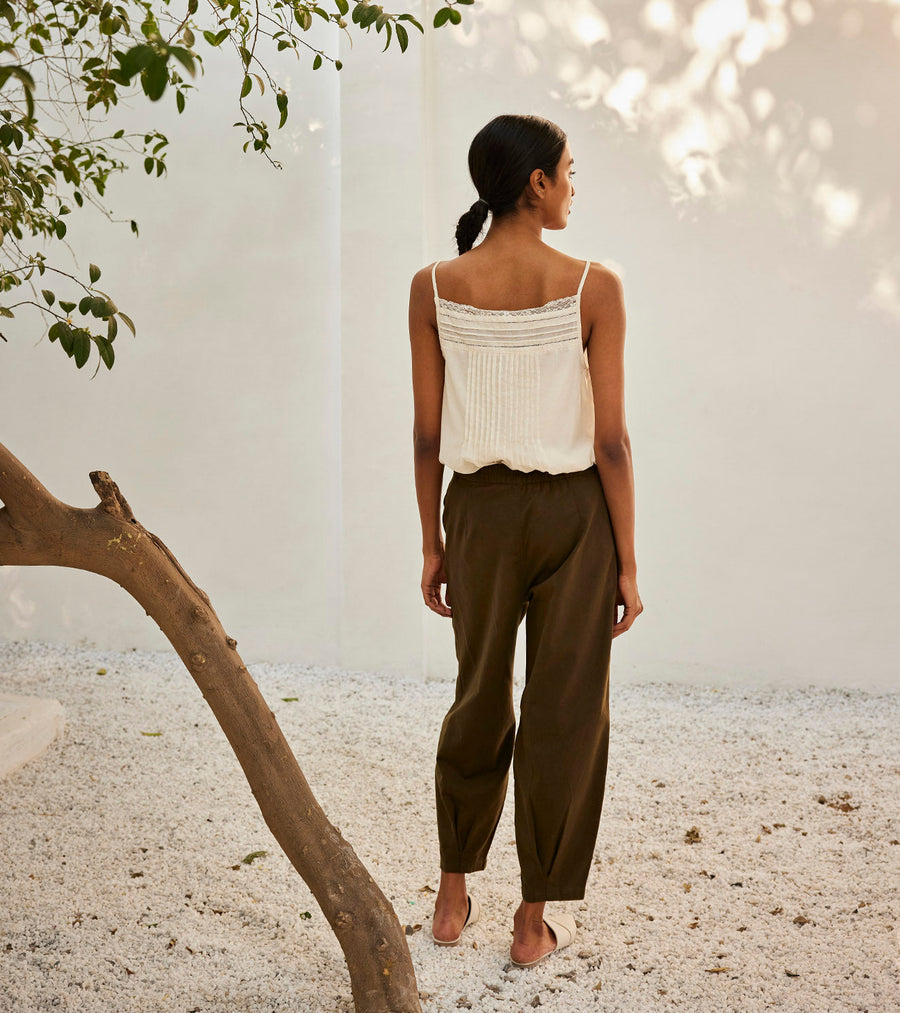 A Model Wearing White Pure Cotton Olive Dreams Trouser, curated by Only Ethikal