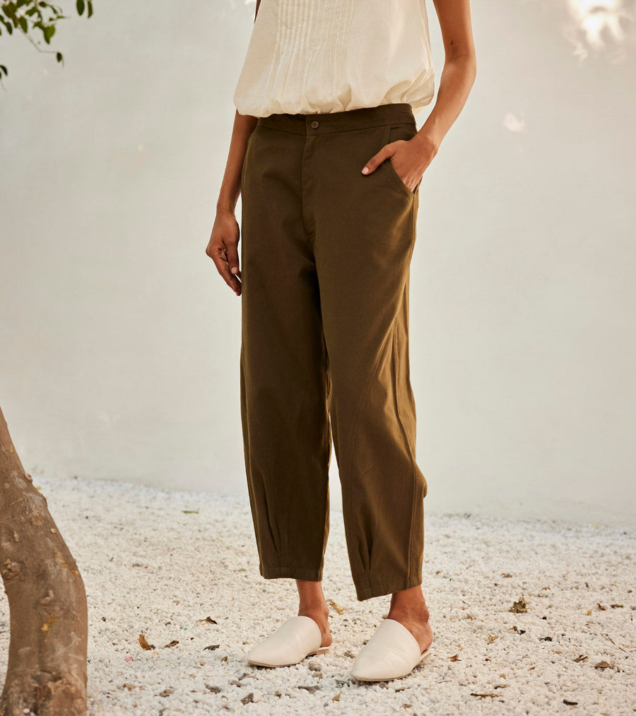 A Model Wearing White Pure Cotton Olive Dreams Trouser, curated by Only Ethikal