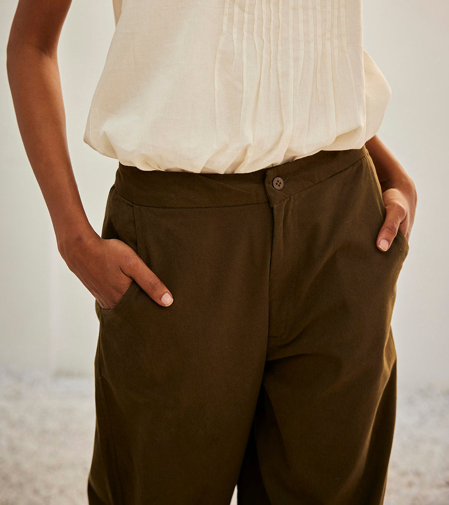 A Model Wearing White Pure Cotton Olive Dreams Trouser, curated by Only Ethikal