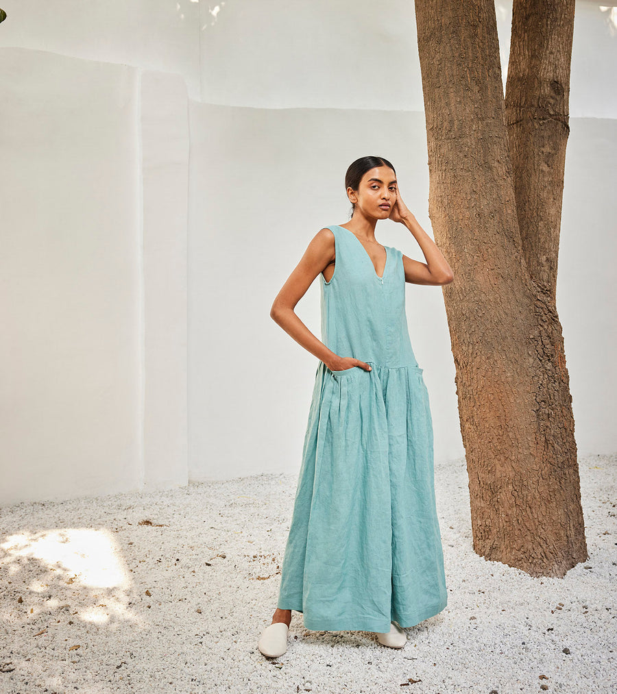 A Model Wearing Blue Linen Morning Sky Jumpsuit, curated by Only Ethikal