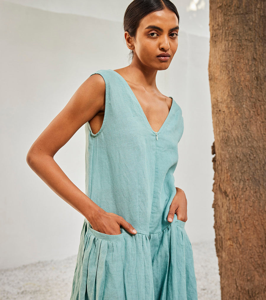 A Model Wearing Blue Linen Morning Sky Jumpsuit, curated by Only Ethikal