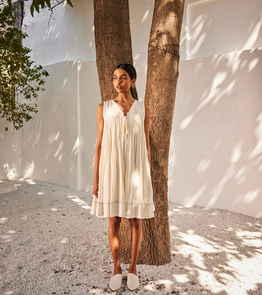 A Model Wearing White Pure Cotton White Mist Dress, curated by Only Ethikal