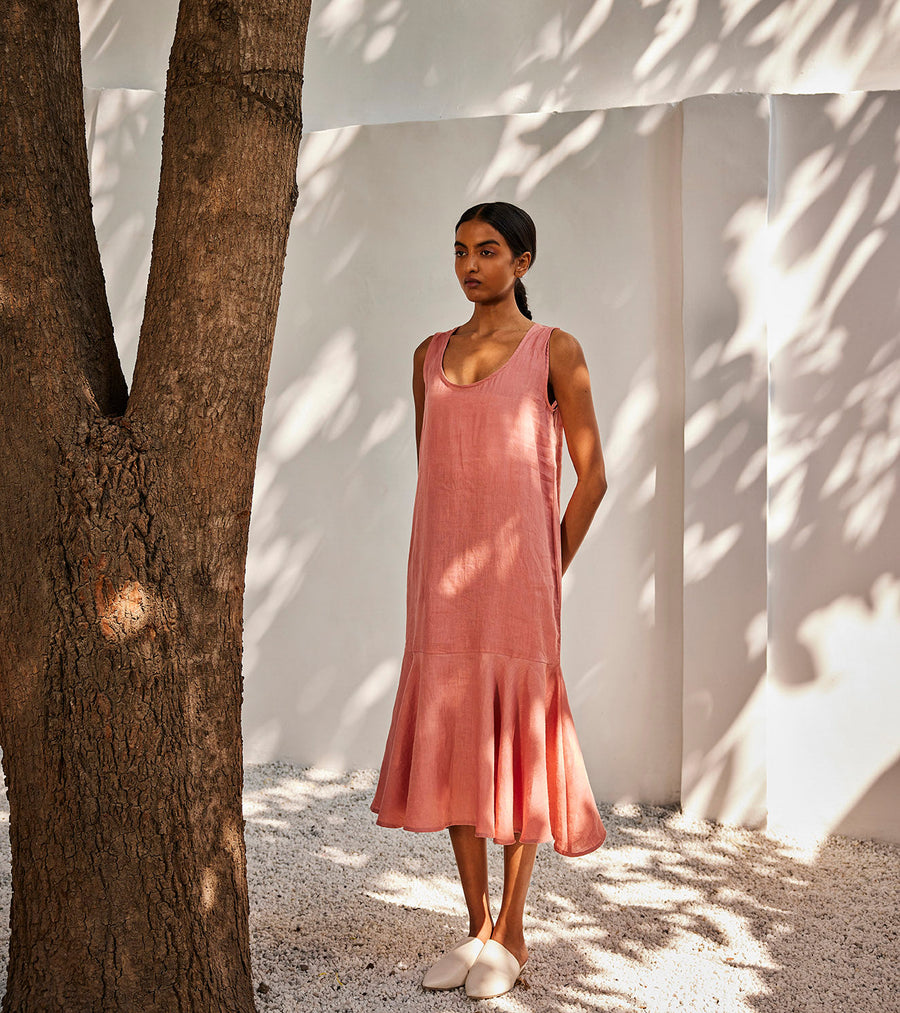 A Model Wearing Peach Linen Soft Gaze Midi Dress, curated by Only Ethikal