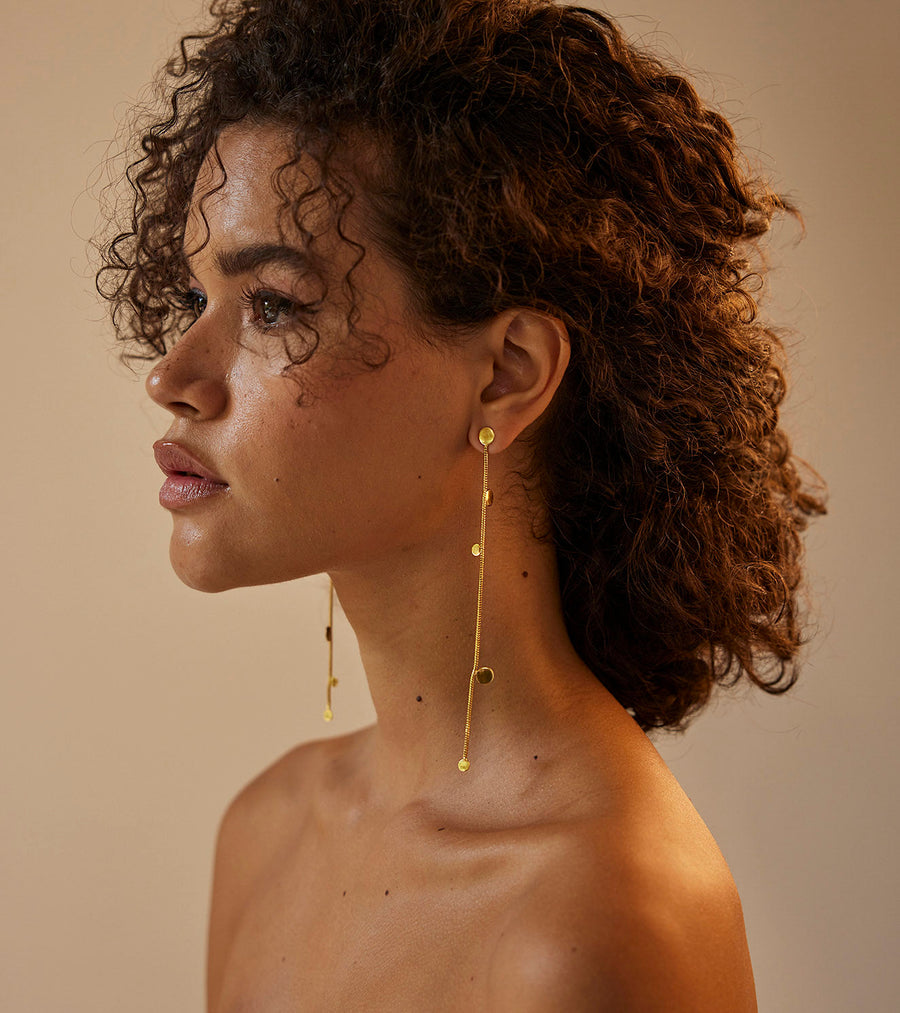 A Model Wearing Yellow 1 micron gold plated. Rumi Earring, curated by Only Ethikal