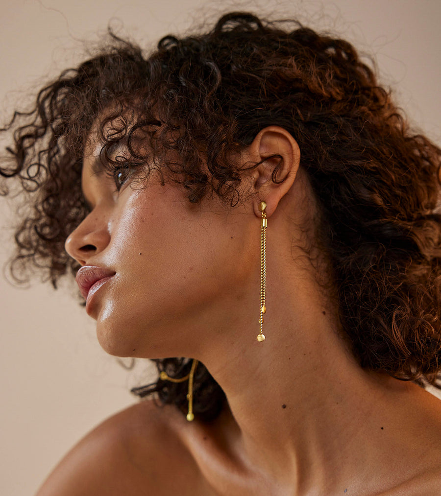 A Model Wearing Yellow 1 micron gold plated. Noora Earring, curated by Only Ethikal