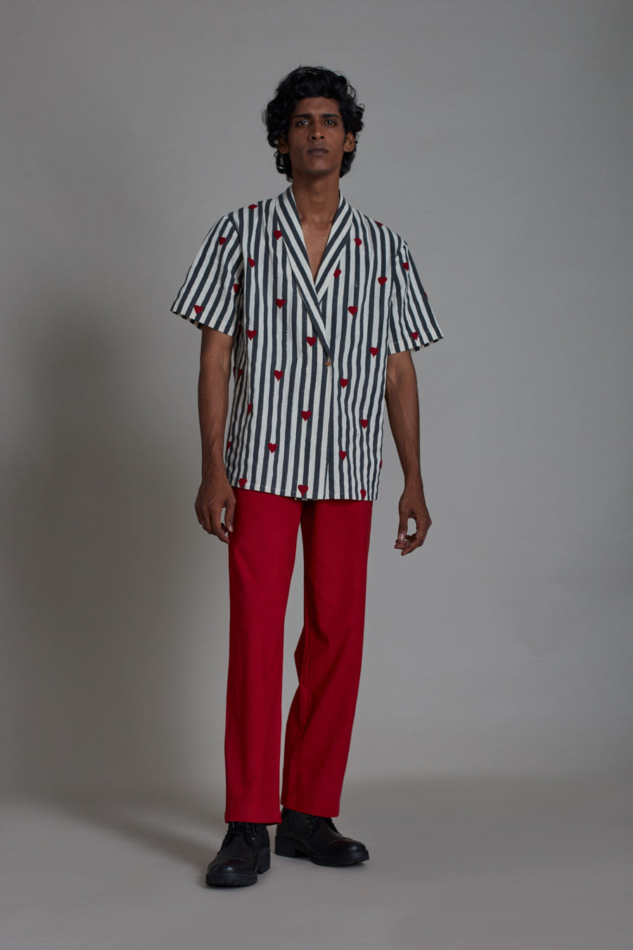 A Model Wearing White Pure Cotton Men's Bluff Set Black & Red, curated by Only Ethikal