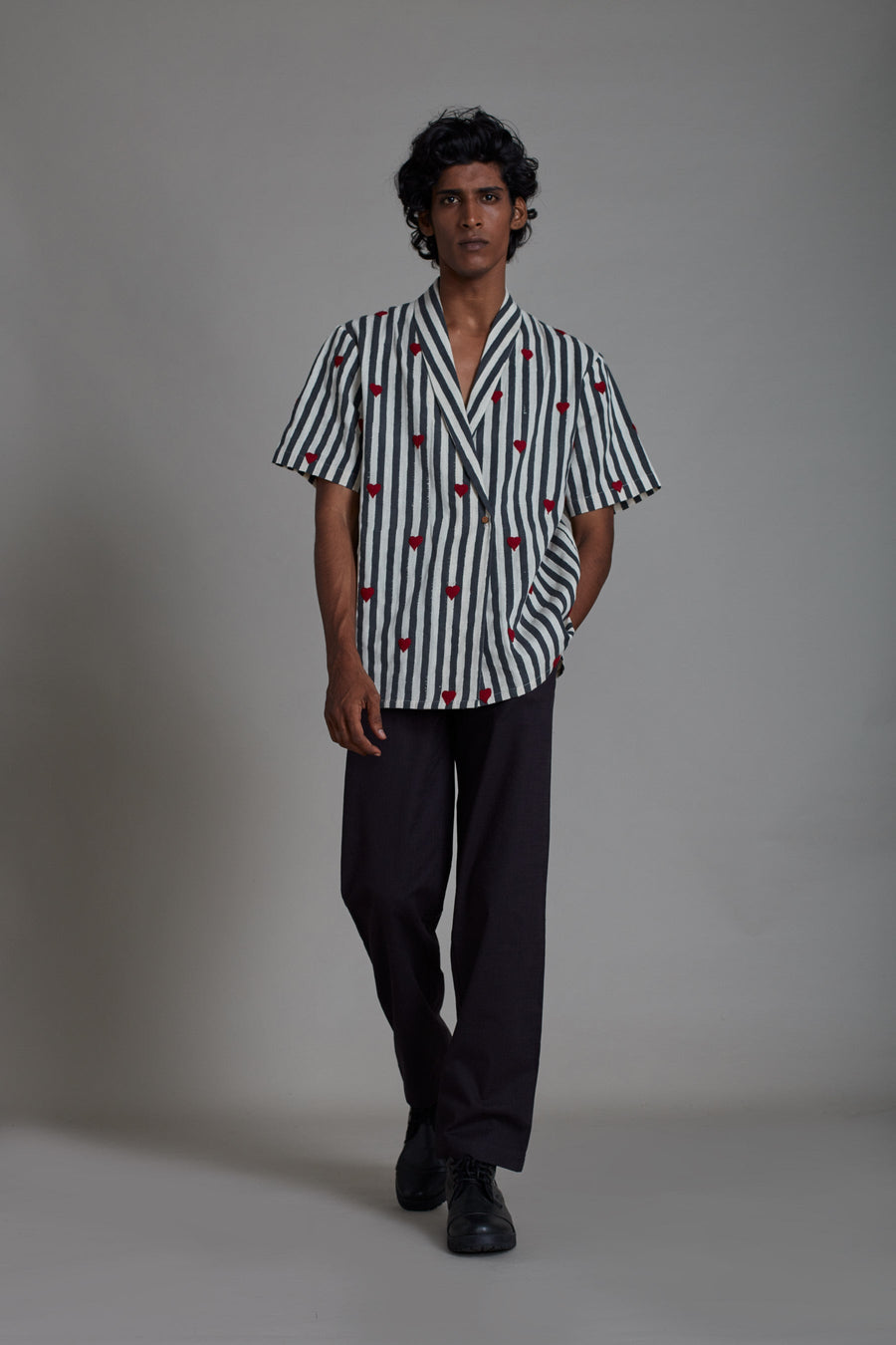 A Model Wearing White Pure Cotton Men's Bluff Set Black Stripe, curated by Only Ethikal