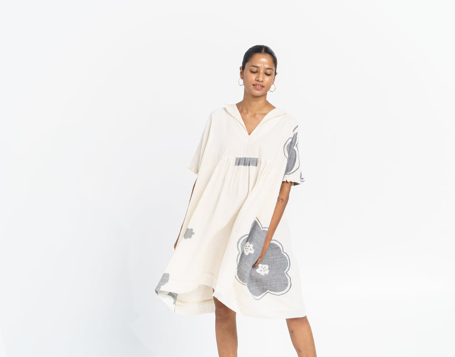 A Model Wearing White Handwoven Cotton Oversized Summer Blossom Dress, curated by Only Ethikal