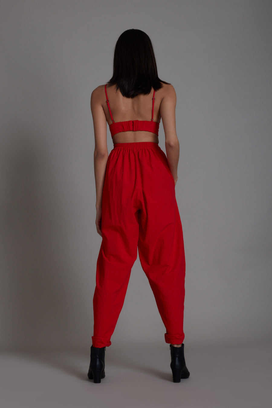 A Model Wearing Red Pure Cotton Red Mile Pants, curated by Only Ethikal