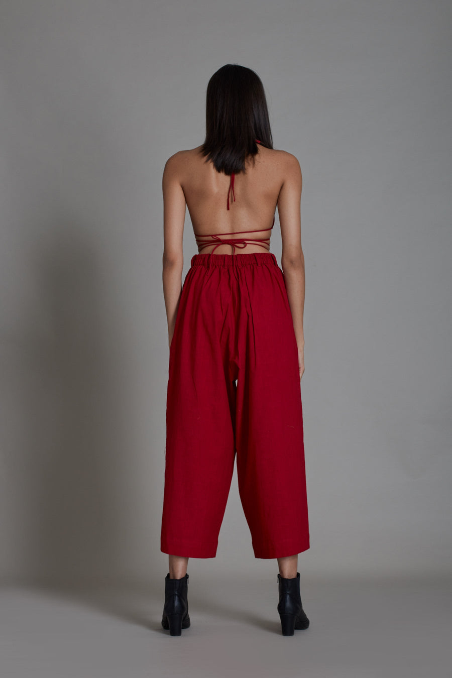 A Model Wearing Red Pure Cotton Solitaire Pants- Red, curated by Only Ethikal