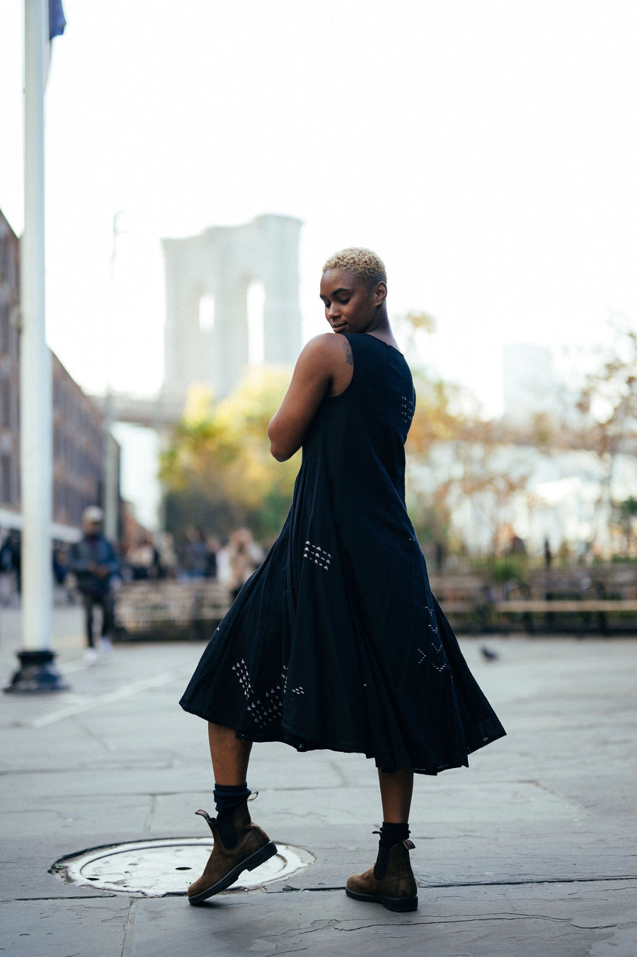 A Model Wearing Black Handwoven Cotton Scoop-Neck Gathered Midi Dress, curated by Only Ethikal