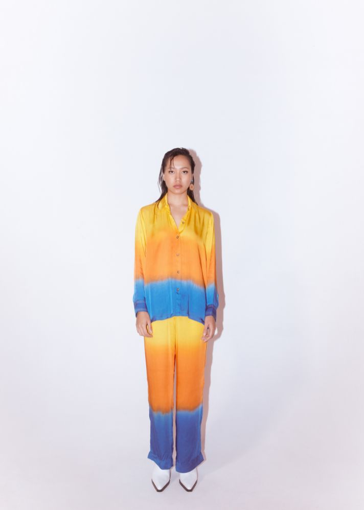 A Model Wearing Multicolor Organic Cupro Ocean Leheriya Shirt And Pants Co-Ord (Yellow/ Orange/ Blue), curated by Only Ethikal