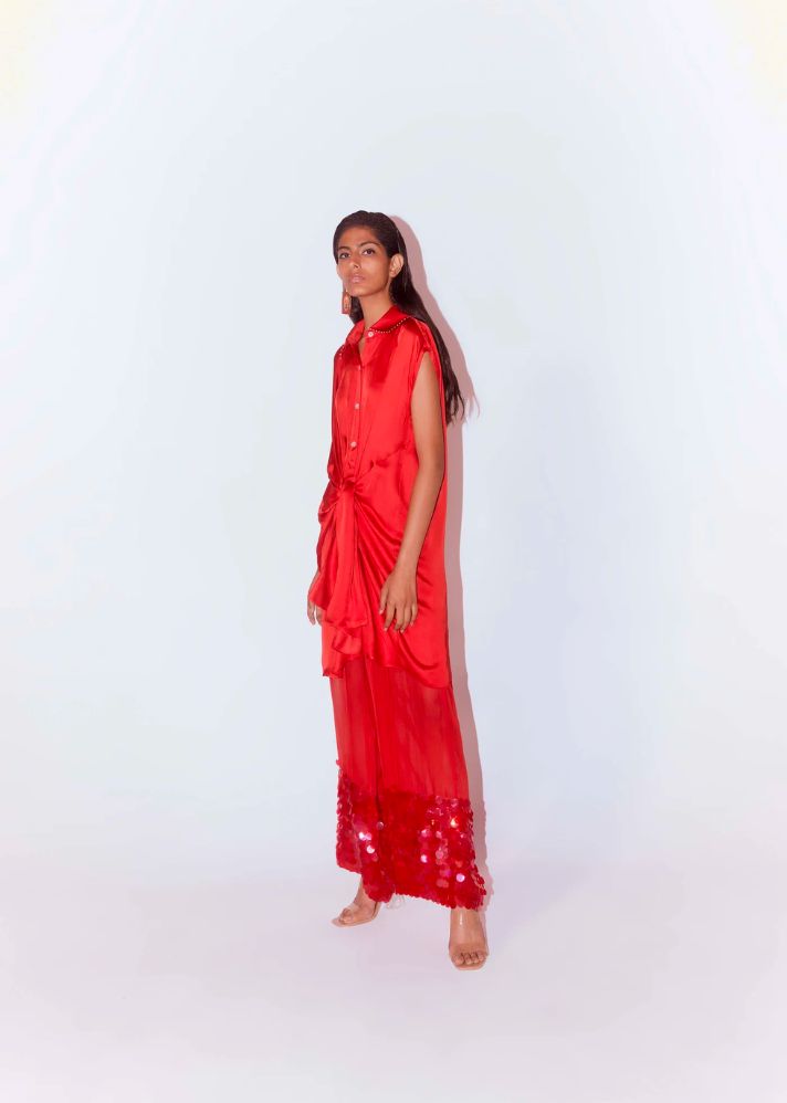 A Model Wearing Red Organic Cupro Aspen Organza Embroidered Trousers (Red), curated by Only Ethikal