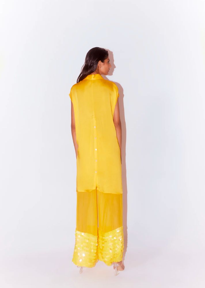 A Model Wearing Yellow Organic Cupro Aspen Organza Embroidered Trousers (Yellow), curated by Only Ethikal