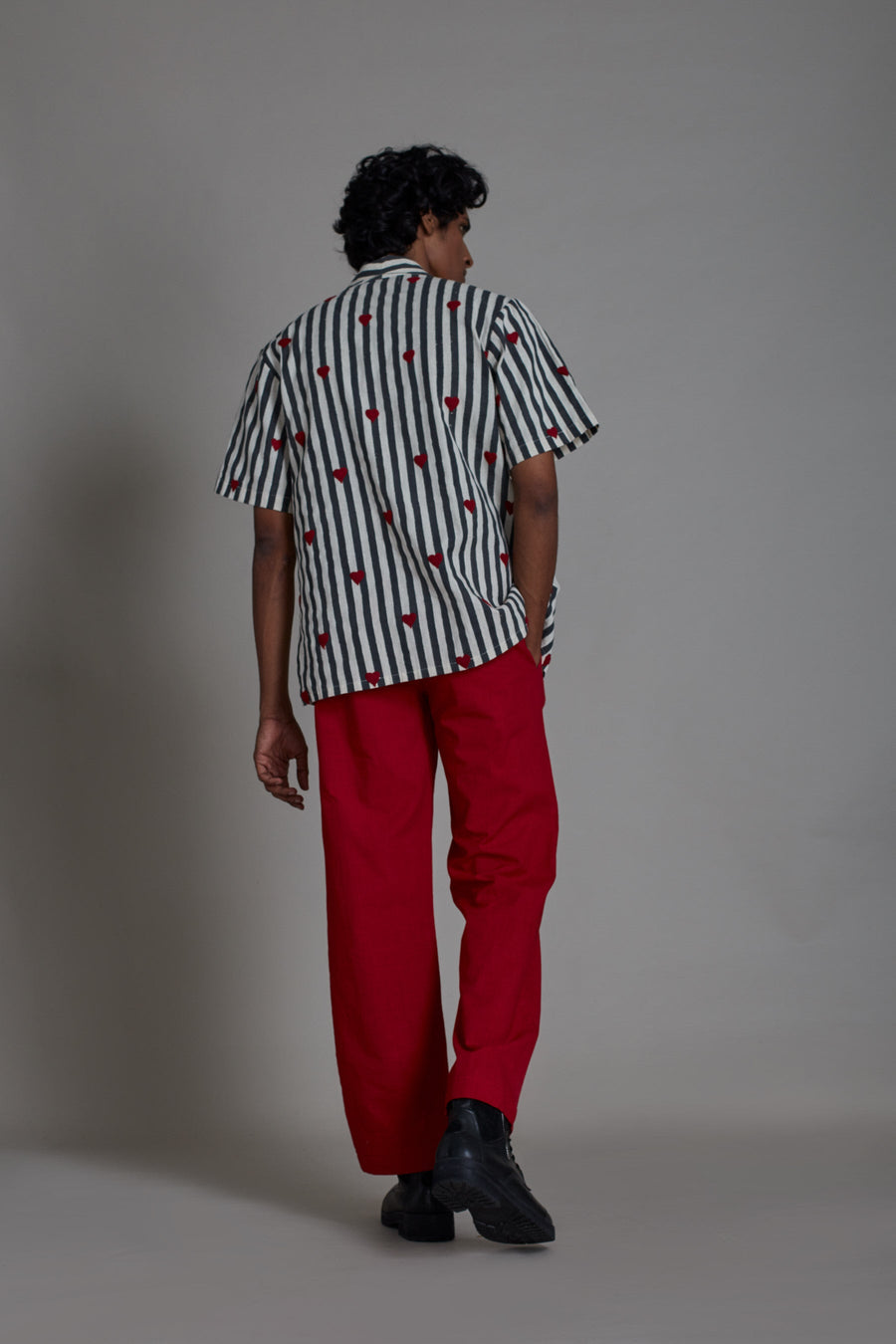 A Model Wearing Red Pure Cotton Taash Straight Red Pants, curated by Only Ethikal