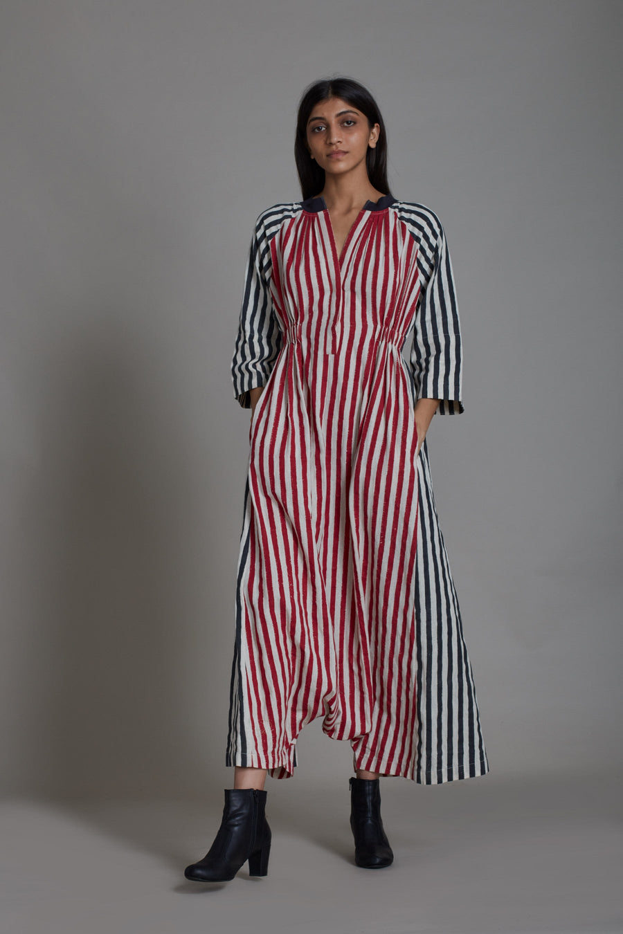 A Model Wearing Multicolor Pure Cotton Uno Stripe Jumpsuit- Red With Black, curated by Only Ethikal